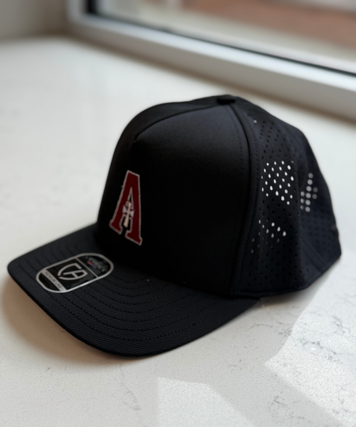 Premium Water-Resistant Perforated Hat - Black - A logo